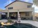 Two story home with a covered patio, pool, and BBQ area at 11340 E Stearn Ave, Mesa, AZ 85212