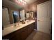 Bathroom with double vanity and updated fixtures at 11340 E Stearn Ave, Mesa, AZ 85212