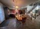 Bright dining room adjacent to the kitchen at 11340 E Stearn Ave, Mesa, AZ 85212