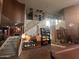 Grand two-story entryway with a staircase and built-in shelving at 11340 E Stearn Ave, Mesa, AZ 85212