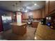 Kitchen with island and stainless steel appliances at 11340 E Stearn Ave, Mesa, AZ 85212