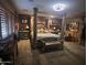 Spacious main bedroom with a large four poster bed and sitting area at 11340 E Stearn Ave, Mesa, AZ 85212
