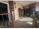 Upstairs hallway with display cabinets and access to bedrooms at 11340 E Stearn Ave, Mesa, AZ 85212