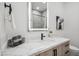 Modern bathroom with marble vanity, sleek fixtures, and a large mirror at 1501 N Miller Rd # 1003, Scottsdale, AZ 85257