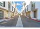View of the community from the street, showcasing modern architecture at 1501 N Miller Rd # 1003, Scottsdale, AZ 85257