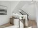 Stylish entryway with modern console table and staircase view at 1501 N Miller Rd # 1003, Scottsdale, AZ 85257