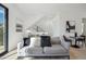 Light-filled living area features a comfortable sofa and modern decor at 1501 N Miller Rd # 1003, Scottsdale, AZ 85257