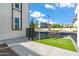Modern building exterior with mailboxes and a dog park at 1501 N Miller Rd # 1003, Scottsdale, AZ 85257
