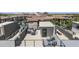 Private rooftop deck with seating area and city views at 1501 N Miller Rd # 1003, Scottsdale, AZ 85257