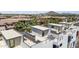 Modern rooftop deck with built-in grill and seating at 1501 N Miller Rd # 1003, Scottsdale, AZ 85257