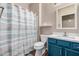 Clean bathroom, featuring blue vanity and shower/tub at 15112 W Greystone Dr, Sun City West, AZ 85375