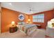 Bedroom with bed, ceiling fan, and dresser at 15809 N Bowling Green Dr, Sun City, AZ 85351