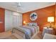 Bedroom with bed, ceiling fan, and dresser at 15809 N Bowling Green Dr, Sun City, AZ 85351