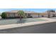 Ranch style home with a two-car garage and nicely landscaped yard at 15809 N Bowling Green Dr, Sun City, AZ 85351