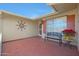 Inviting front porch with tile flooring and decorative accents at 15809 N Bowling Green Dr, Sun City, AZ 85351