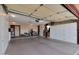 Spacious garage with extra storage cabinets and space for tools at 15809 N Bowling Green Dr, Sun City, AZ 85351