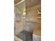 Walk-in shower with tiled walls and seat at 15809 N Bowling Green Dr, Sun City, AZ 85351