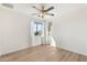 Simple bedroom with light walls and hardwood floors at 1721 S 64Th Ave, Phoenix, AZ 85043