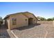 Low maintenance desert landscaping makes the perfect backyard for enjoying the warm Arizona weather at 17750 W Watson Ln, Surprise, AZ 85388