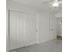 Bedroom featuring a closet with sliding doors, neutral walls, and a ceiling fan, creating a tidy and cozy atmosphere at 17750 W Watson Ln, Surprise, AZ 85388