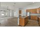 Open-concept kitchen featuring tile flooring and stainless steel appliances perfect for modern living and entertaining at 17750 W Watson Ln, Surprise, AZ 85388