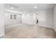 Large bedroom with neutral carpet, recessed lighting, and bright natural light at 17857 W Getty Dr, Goodyear, AZ 85338