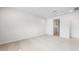 Spacious bedroom with neutral carpet, recessed lighting, and an en-suite bathroom at 17857 W Getty Dr, Goodyear, AZ 85338