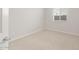 Bright bedroom with natural light and soft carpet flooring at 17875 W Getty Dr, Goodyear, AZ 85338