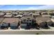 An aerial view of the home in a well-maintained neighborhood at 18017 W Desert Ln, Surprise, AZ 85388