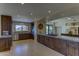 Spacious kitchen with granite countertops and dark wood cabinets at 1854 Century Way, Carefree, AZ 85377