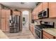 Well-equipped kitchen with stainless steel appliances and spacious countertops at 21134 W Sunrise Ln, Buckeye, AZ 85396