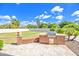 Outdoor kitchen area with a built-in grill and ample counter space, perfect for summer barbecues at 2222 N Val Vista Dr # 2, Mesa, AZ 85213