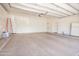 Spacious garage with epoxy flooring and storage at 2222 N Val Vista Dr # 2, Mesa, AZ 85213