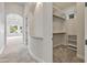Hallway leading to living room and walk-in closet at 2222 N Val Vista Dr # 2, Mesa, AZ 85213