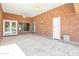 Covered patio area with brick walls, ceiling fans, and tile flooring, offering a relaxing outdoor space at 2222 N Val Vista Dr # 2, Mesa, AZ 85213