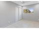 Bright bedroom with tile floors and sliding closet doors at 225 N Standage St # 78, Mesa, AZ 85201