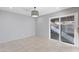 Simple dining area with tiled floors and sliding glass door at 225 N Standage St # 78, Mesa, AZ 85201