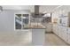 Updated kitchen with wood countertops and a breakfast bar at 225 N Standage St # 78, Mesa, AZ 85201