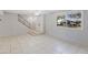 Spacious living room with tiled floors and ceiling fan at 225 N Standage St # 78, Mesa, AZ 85201