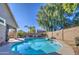 Sparkling pool with patio and lush landscaping at 23306 S 221St St, Queen Creek, AZ 85142