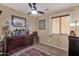 Charming bedroom with dresser and ceiling fan at 23818 N High Dunes Dr, Florence, AZ 85132