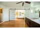 Bedroom with hardwood floors and barn doors leading to another bedroom at 33 W Lynwood St, Phoenix, AZ 85003