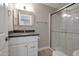 Modern bathroom with a stylish vanity, shower, and sleek fixtures at 358 N 82Nd Way, Mesa, AZ 85207