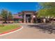 Attractive building with a stylish facade, well-manicured landscaping, and ample parking space at 42017 N Crooked Stick Rd, Anthem, AZ 85086