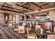 Elegant restaurant featuring a full bar, cozy seating and TVs, ideal for dining and socializing at 42017 N Crooked Stick Rd, Anthem, AZ 85086