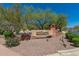 Community entrance sign surrounded by manicured landscaping under a clear blue sky at 42017 N Crooked Stick Rd, Anthem, AZ 85086
