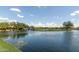Picturesque golf course water feature with a small waterfall and lush green surroundings at 42017 N Crooked Stick Rd, Anthem, AZ 85086