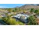 Aerial view of the private backyard oasis with a stunning pool, spa, and lush landscaping at 4340 E Turquoise Ave, Phoenix, AZ 85028