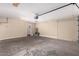 Garage with door opener and extra storage space at 4446 W Townley Ave, Glendale, AZ 85302