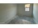 An unfinished bedroom with a window at 47733 W Moeller Rd, Maricopa, AZ 85139